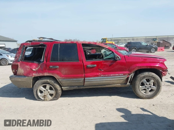 2004 Jeep Grand Cherokee Laredo z VIN 1J4GW48S34C289321, wystawiony jako IAAI lot #42062819 z przebiegiem Nie podano mil oraz . Historia ofert i sprzedaży dostępna na DreamBid. Obrazek 13.