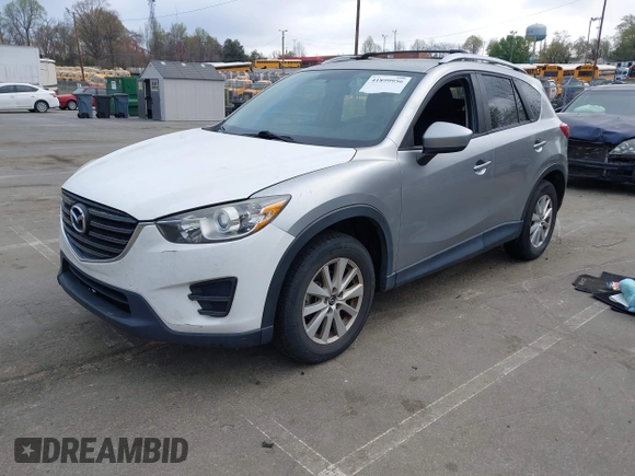 2013 Mazda CX-5 Touring with VIN JM3KE2CE0D0105115, listed as a IAAI auction lot 41899956 with 301,264 mi miles. Bid and sale history available at carsss.com. Image 2.