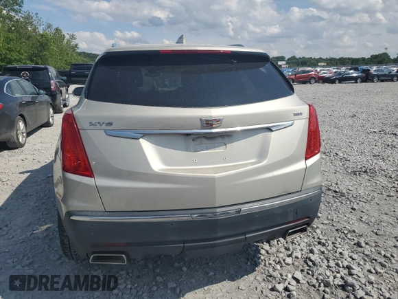 2017 Cadillac XT5 Luxury FWD z VIN 1GYKNBRS9HZ121914, wystawiony jako Copart lot #56901985 z przebiegiem 81 017 mil mil oraz Szkoda całkowita • Salvage title. Historia ofert i sprzedaży dostępna na DreamBid. Obrazek 6.