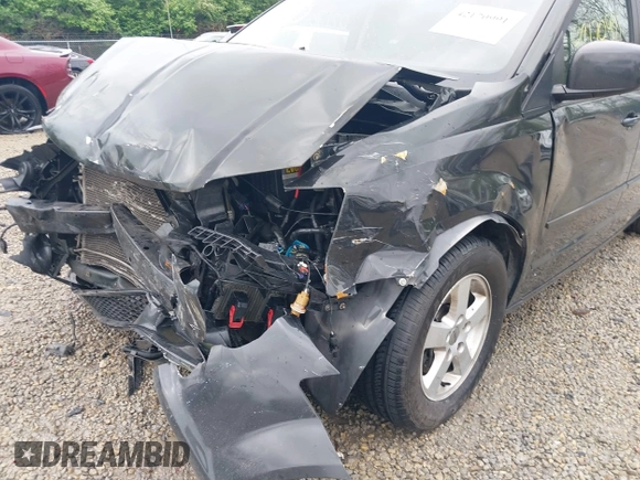2012 Dodge Grand Caravan SXT with VIN 2C4RDGCG7CR236328, listed as a IAAI auction lot 42170991 with 72,831 mi miles and . Bid and sale history available at DreamBid. Image 19.