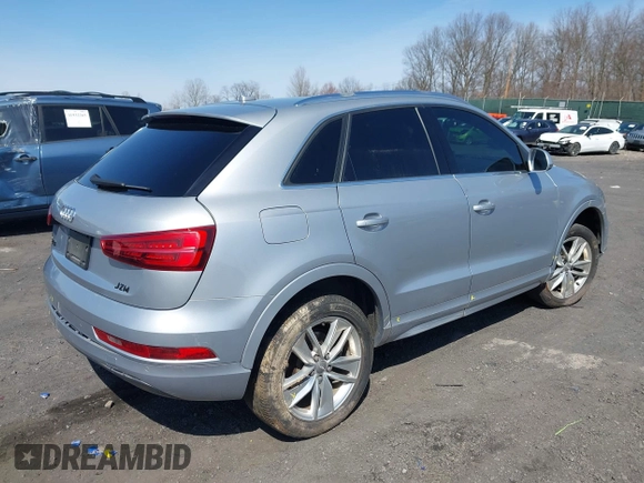 2016 Audi Q3 Premium Plus with VIN WA1EFCFS1GR016996, listed as a IAAI auction lot 41942380 with 90,852 mi miles and . Bid and sale history available at DreamBid. Image 4.