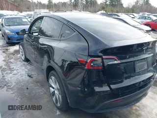 2023 Tesla Model Y Long Range z VIN 7SAYGDEE8PF826989, wystawiony jako IAAI lot #41615166 z przebiegiem 10 368 mil mil oraz . Historia ofert i sprzedaży dostępna na DreamBid. Obrazek 3.