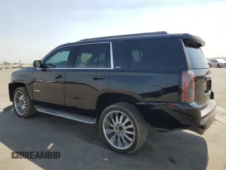 2016 GMC Yukon SLT with VIN 1GKS1BKCXGR122111, listed as a Copart auction lot 69900124 with 73,781 mi miles and Salvage Title. Bid and sale history available at carsss.com. Image 2.
