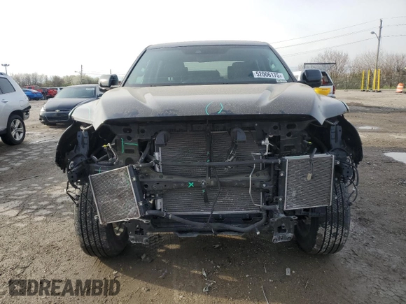 2023 Toyota Tundra Limited with VIN 5TFJA5DB9PX069197, listed as a Copart auction lot 52006175 with 7,396 mi miles and Salvage title. Bid and sale history available at DreamBid. Image 5.