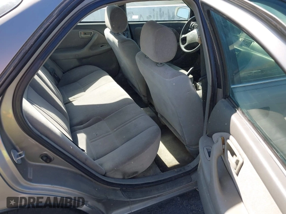 2000 Toyota Camry CE with VIN 4T1BG22K3YU643229, listed as a IAAI auction lot 42162845 with 142,457 mi miles and . Bid and sale history available at carsss.com. Image 8.