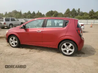 2012 Chevrolet Sonic LTZ with VIN 1G1JE6SH7C4111176, listed as a Copart auction lot 59002575 with 116,640 mi miles and Salvage title. Bid and sale history available at DreamBid. Image 2.