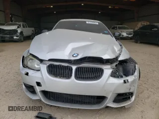 2011 BMW 3 Series 335is with VIN WBAKG1C50BE599437, listed as a Copart auction lot 61936864 with 165,046 mi miles and Salvage Title. Bid and sale history available at carsss.com. Image 5.