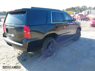 2019 Chevrolet Tahoe LT with VIN 1GNSKBKC3KR345776, listed as a IAAI auction lot 41674948 with 119,871 mi miles. Bid and sale history available at carsss.com. Image 4.