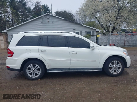 2011 Mercedes-Benz GL-Class GL 450 with VIN 4JGBF7BE0BA730685, listed as a IAAI auction lot 42029019 with 142,190 mi miles. Bid and sale history available at carsss.com. Image 14.