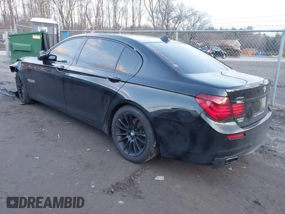 2015 BMW 7 Series 740Li xDrive with VIN WBAYF4C51FGS99074, listed as a IAAI auction lot 41222498 with 132,789 mi miles. Bid and sale history available at carsss.com. Image 3.