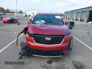 2020 Cadillac XT6 AWD Sport z VIN 1GYKPHRS1LZ201472, wystawiony jako IAAI lot #40610438 z przebiegiem 71 540 mil mil oraz . Historia ofert i sprzedaży dostępna na DreamBid. Obrazek 12.