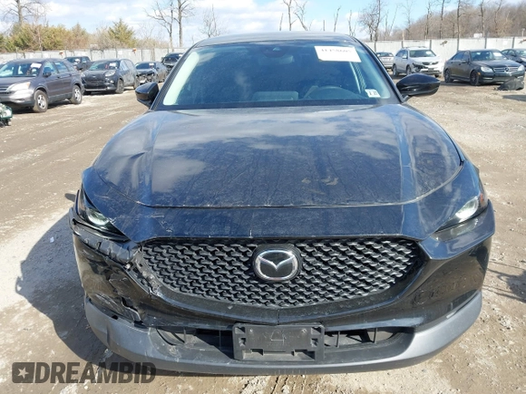 2022 Mazda CX-30 S with VIN 3MVDMBALXNM402265, listed as a IAAI auction lot 41458605 with 76,291 mi miles and . Bid and sale history available at carsss.com. Image 12.