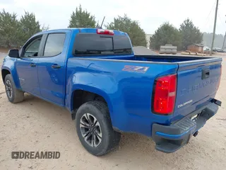 2022 Chevrolet Colorado 4WD Z71 z VIN 1GCGTDEN8N1152160, wystawiony jako IAAI lot #42103617 z przebiegiem 43 304 mil mil oraz . Historia ofert i sprzedaży dostępna na DreamBid. Obrazek 3.