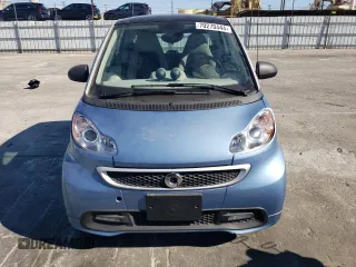 2014 Smart fortwo Passion z VIN WMEEJ9AA5EK778600, wystawiony jako Copart lot #70270444 z przebiegiem 20 545 mil mil oraz Tytuł czysty. Historia ofert i sprzedaży dostępna na DreamBid. Obrazek 5.
