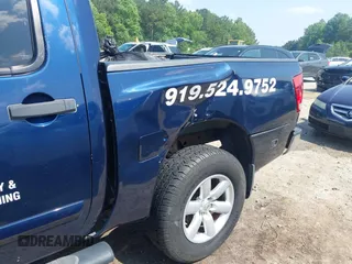2010 Nissan Titan Pro-4X with VIN 1N6BA0EC2AN313626, listed as a IAAI auction lot 42441316 with 177,823 mi miles and . Bid and sale history available at DreamBid. Image 18.