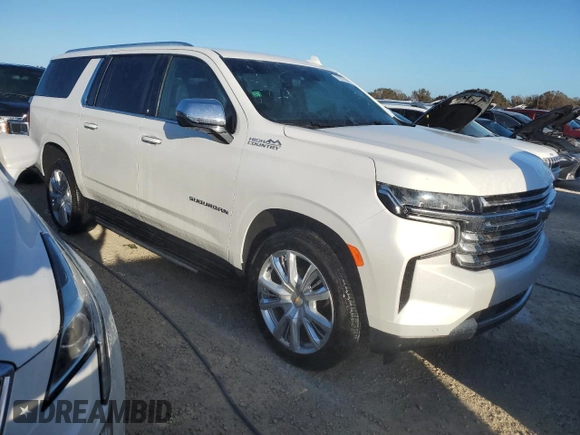 2022 Chevrolet Suburban High Country with VIN 1GNSKGKL3NR233657, listed as a Copart auction lot 74177244 with 9,111 mi miles and Salvage Title. Bid and sale history available at DreamBid. Image 4.