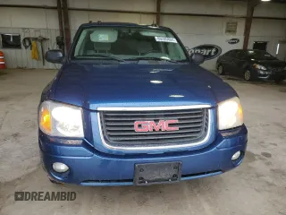 2005 GMC Envoy SLT with VIN 1GKDS13S352104934, listed as a Copart auction lot 86205864 with 166,638 mi miles and Clean Title. Bid and sale history available at carsss.com. Image 5.