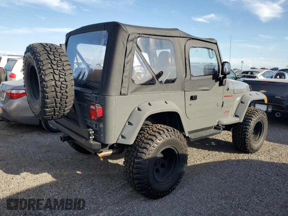 1997 Jeep Wrangler Sport with VIN 1J4FY19S5VP520801, listed as a Copart auction lot 75301274 with Not Provided miles and Non Repairable. Bid and sale history available at carsss.com. Image 3.