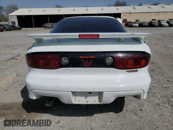 2002 Pontiac Firebird Formula z VIN 2G2FV22G222150957, wystawiony jako Copart lot #48037565 z przebiegiem 112 784 mil mil oraz Szkody całkowita. Historia ofert i sprzedaży dostępna na DreamBid. Obrazek 6.