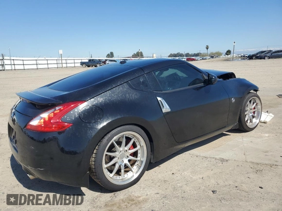 2013 Nissan 370Z Touring z VIN JN1AZ4EH4DM881576, wystawiony jako Copart lot #50645635 z przebiegiem 123 515 mil mil oraz Szkoda całkowita • Salvage title. Historia ofert i sprzedaży dostępna na DreamBid. Obrazek 3.