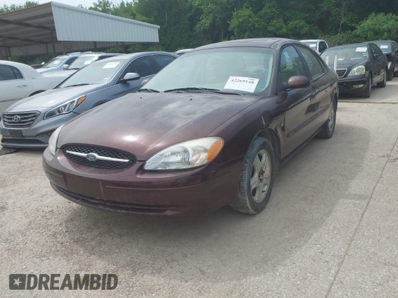 2000 Ford Taurus SEL with VIN 1FAFP56S2YA183814, listed as a IAAI auction lot 42269148 with 210,990 mi miles and . Bid and sale history available at DreamBid. Image 2.