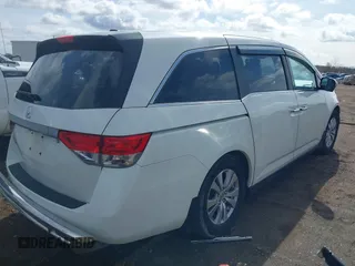 2014 Honda Odyssey EX-L with VIN 5FNRL5H63EB136541, listed as a IAAI auction lot 41866320 with 148,696 mi miles and . Bid and sale history available at DreamBid. Image 4.
