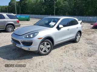 2012 Porsche Cayenne S Hybrid z VIN WP1AE2A20CLA92424, wystawiony jako IAAI lot #42315279 z przebiegiem 129 119 mil mil oraz . Historia ofert i sprzedaży dostępna na DreamBid. Obrazek 2.