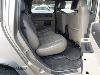 2005 Hummer H2 SUV with VIN 5GRGN23U65H101545, listed as a IAAI auction lot 41426274 with 293,821 mi miles. Bid and sale history available at carsss.com. Image 8.