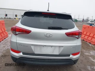 2017 Hyundai Tucson SE with VIN KM8J3CA45HU331252, listed as a IAAI auction lot 41744426 with 76,845 mi miles. Bid and sale history available at carsss.com. Image 16.