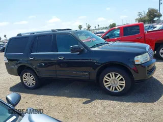 2011 Lincoln Navigator z VIN 5LMJJ2H57BEJ00298, wystawiony jako IAAI lot #42170739 z przebiegiem 175 692 mil mil oraz . Historia ofert i sprzedaży dostępna na DreamBid. Obrazek 13.