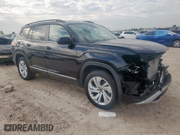 2021 Volkswagen Atlas SE with VIN 1V2WR2CA3MC519899, listed as a Copart auction lot 64051135 with 60,586 mi miles and Salvage title. Bid and sale history available at DreamBid. Image 4.