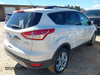 2013 Ford Escape SEL with VIN 1FMCU0HX0DUC07372, listed as a IAAI auction lot 41740884 with 96,436 mi miles and . Bid and sale history available at DreamBid. Image 4.