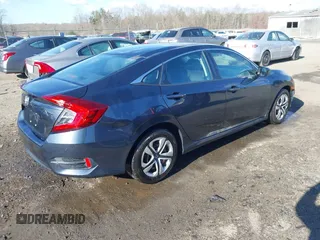2017 Honda Civic LX with VIN 19XFC2F52HE069033, listed as a IAAI auction lot 41866390 with 68,050 mi miles and . Bid and sale history available at DreamBid. Image 4.