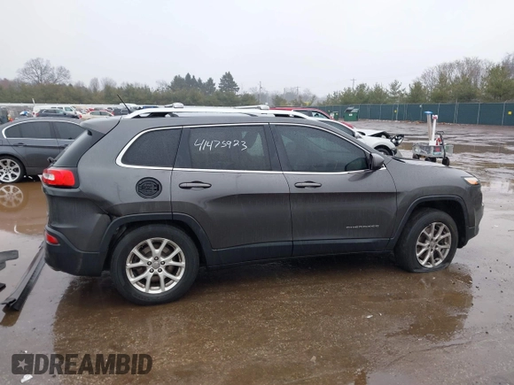 2014 Jeep Cherokee Latitude z VIN 1C4PJMCS5EW137875, wystawiony jako IAAI lot #41475923 z przebiegiem 124 565 mil mil oraz . Historia ofert i sprzedaży dostępna na DreamBid. Obrazek 13.