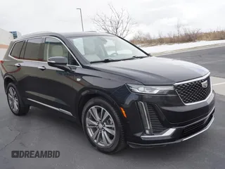 2021 Cadillac XT6 Premium Luxury with VIN 1GYKPDRS3MZ113033, listed as a Copart auction lot 50076845 with 104,248 mi miles and Salvage Title. Bid and sale history available at carsss.com. Image 1.