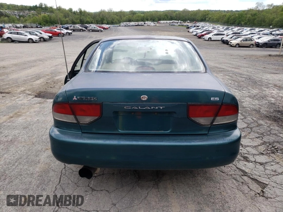 1997 Mitsubishi Galant ES z VIN 4A3AJ56G5VE019296, wystawiony jako Copart lot #56047635 z przebiegiem 87 533 mil mil oraz Szkoda całkowita • Salvage title. Historia ofert i sprzedaży dostępna na DreamBid. Obrazek 6.