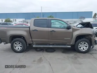 2015 Chevrolet Colorado 4WD WT with VIN 1GCGTAE38F1197422, listed as a IAAI auction lot 41439049 with 138,648 mi miles and . Bid and sale history available at DreamBid. Image 13.