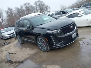 2022 Cadillac XT6 Sport with VIN 1GYKPHRS3NZ138698, listed as a IAAI auction lot 41547570 with 15,919 mi miles. Bid and sale history available at carsss.com. Image 1.