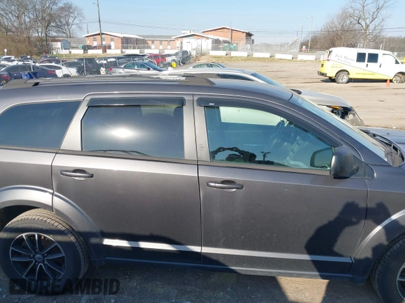 2018 Dodge Journey SE with VIN 3C4PDCAB4JT295807, listed as a IAAI auction lot 41743064 with 105,836 mi miles and . Bid and sale history available at DreamBid. Image 14.
