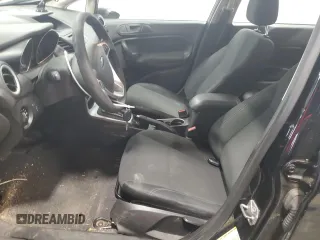 2019 Ford Fiesta SE z VIN 3FADP4BJ9KM151046, wystawiony jako Copart lot #56862255 z przebiegiem 77 002 mil mil oraz Tytuł czysty. Historia ofert i sprzedaży dostępna na DreamBid. Obrazek 7.