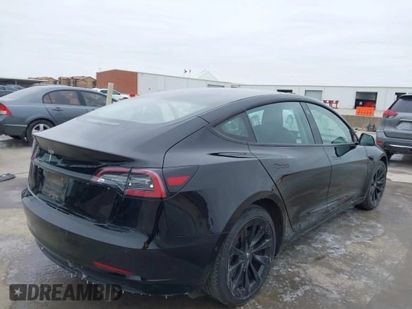 2022 Tesla Model 3 with VIN 5YJ3E1EA0NF191336, listed as a IAAI auction lot 41600441 with 126,671 mi miles and . Bid and sale history available at DreamBid. Image 4.
