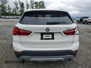2016 BMW X1 xDrive28i z VIN WBXHT3C37GP882189, wystawiony jako Copart lot #56983985 z przebiegiem 45 700 mil mil oraz Szkoda całkowita • Salvage title. Historia ofert i sprzedaży dostępna na DreamBid. Obrazek 6.