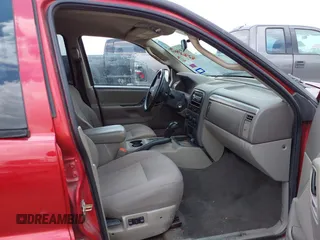 2004 Jeep Grand Cherokee Laredo z VIN 1J4GW48S04C389585, wystawiony jako IAAI lot #42461413 z przebiegiem 228 672 mil mil oraz . Historia ofert i sprzedaży dostępna na DreamBid. Obrazek 5.