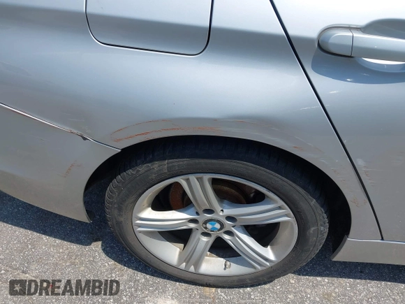 2013 BMW 3 Series 328i xDrive with VIN WBA3B3C52DJ975970, listed as a IAAI auction lot 42280624 with 2,262,225 mi miles and . Bid and sale history available at DreamBid. Image 16.