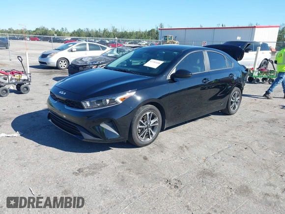 2023 Kia Forte LXS z VIN 3KPF24AD5PE554908, wystawiony jako IAAI lot #41781608 z przebiegiem 84 666 mil mil oraz . Historia ofert i sprzedaży dostępna na DreamBid. Obrazek 2.