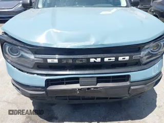 2023 Ford Bronco Sport Outer Banks z VIN 3FMCR9C62PRD61985, wystawiony jako IAAI lot #42304591 z przebiegiem 18 879 mil mil oraz . Historia ofert i sprzedaży dostępna na DreamBid. Obrazek 6.