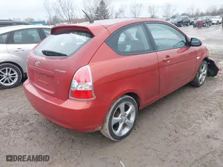 2008 Hyundai Accent SE with VIN KMHCN36C58U070319, listed as a IAAI auction lot 42010544 with 118,487 mi miles. Bid and sale history available at carsss.com. Image 4.