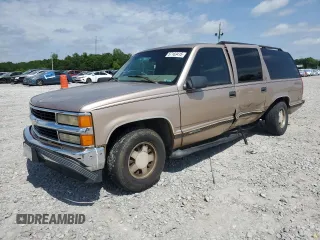 1999 Chevrolet Suburban with VIN 3GNEC16R6XG205408, listed as a Copart auction lot 57169415 with 303,412 mi miles and Salvage title. Bid and sale history available at DreamBid. Image 1.