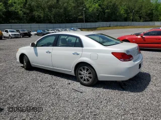 2010 Toyota Avalon XL with VIN 4T1BK3DB8AU370179, listed as a Copart auction lot 54670015 with 186,192 mi miles and Salvage Title. Bid and sale history available at DreamBid. Image 2.