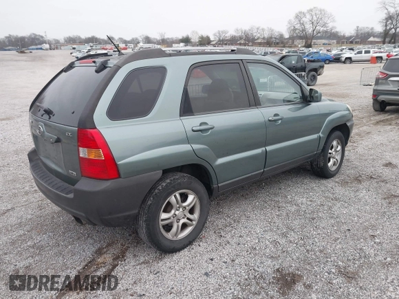 2005 Kia Sportage LX with VIN KNDJF723957038800, listed as a IAAI auction lot 41497596 with 122,189 mi miles and . Bid and sale history available at carsss.com. Image 4.
